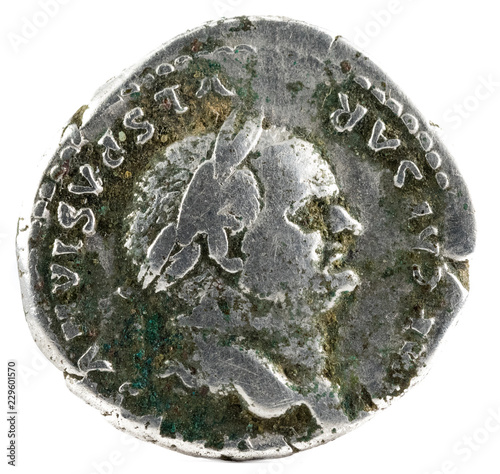 Ancient Roman silver denarius coin of Emperor Vespasian. Obverse.