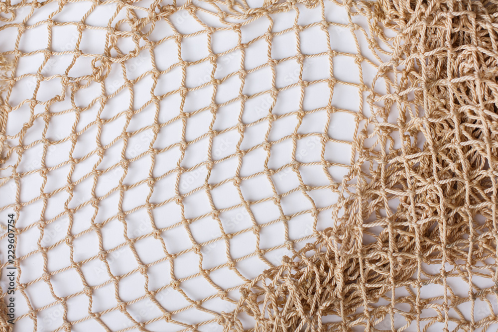 Fishnet on white background. Fishing net. Texture fishnet, seine. Dragnet,  drag, trammel, sweep-net Stock Photo