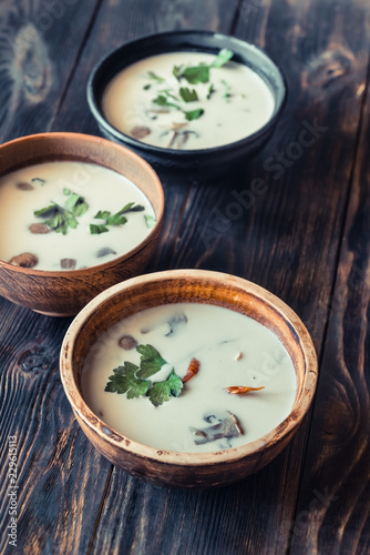 Bowls of thai tom kha soup
