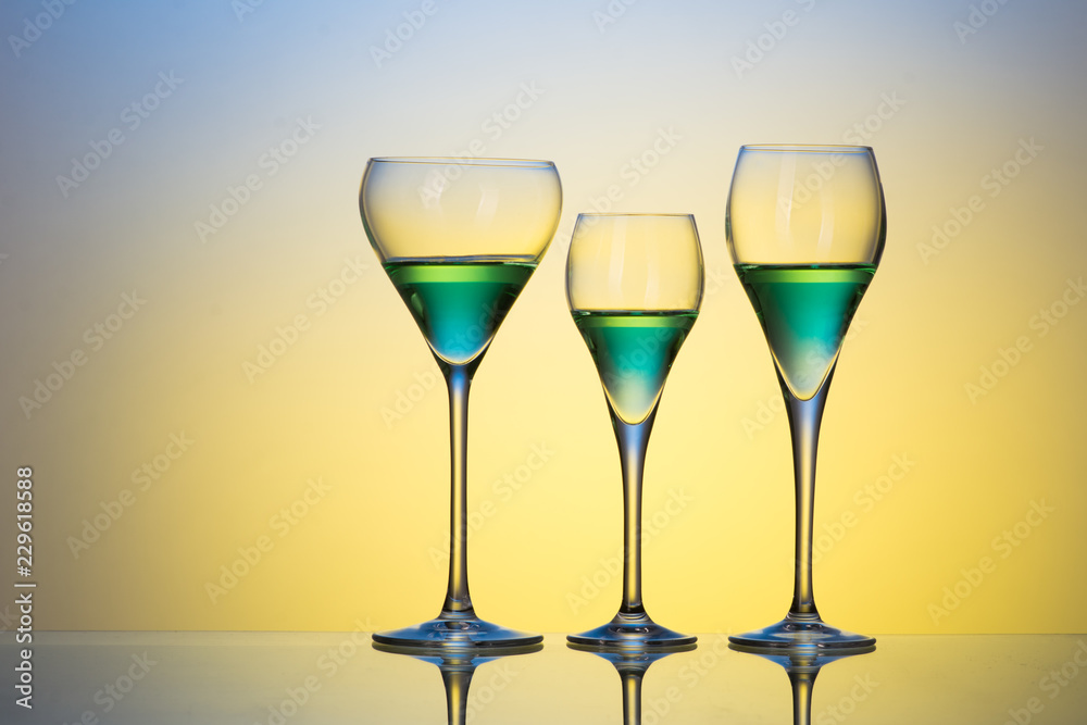 three glasses with cocktails