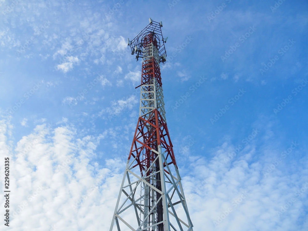 Cellular Signal Tower or Large antenna with broadcast equipment And the frequency bands in the concept of wireless communications technology from the radio. Satellite, wifi, internet