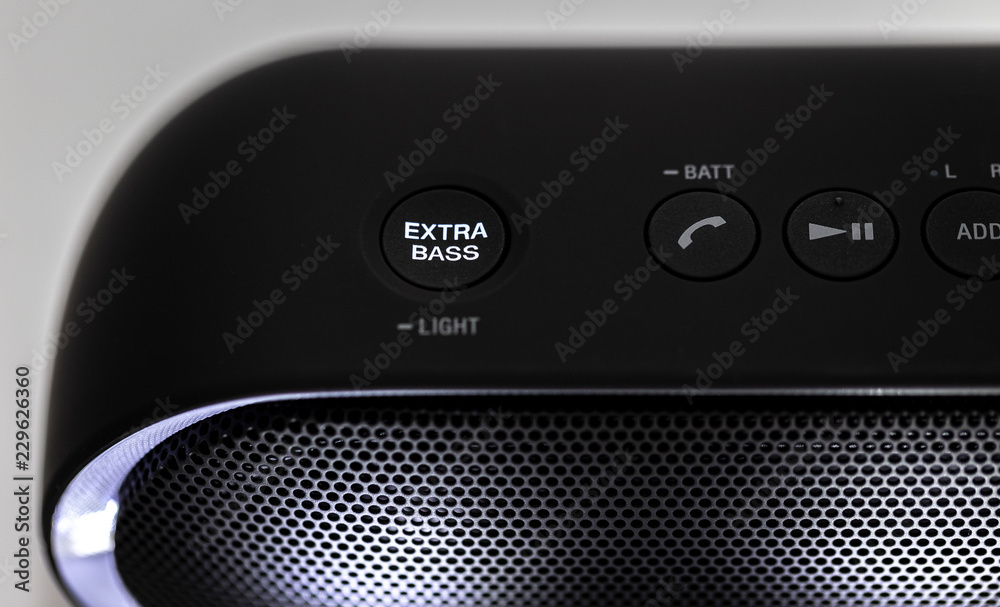 Black Bluetooth speaker with lights on isolated in white background Black Bluetooth speaker with lights on isolated in white background