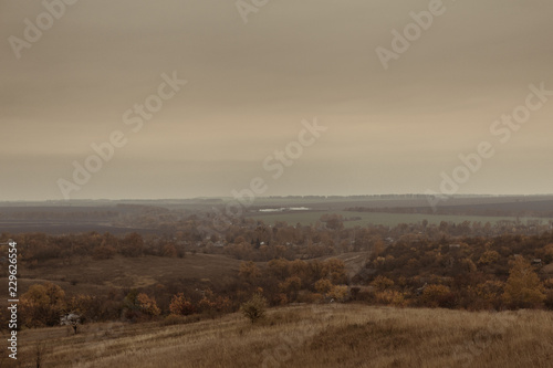 Landscapes in the autumn in cloudy, noir weather. Horizon