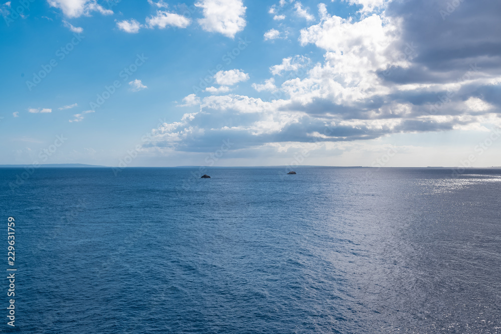 Beautiful ocean with two rocks, background, Ibiza
