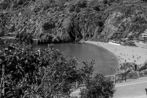 The incredible seascaping view of beach with blue sea in morocco in summer  in Al hoceima in black and white photo