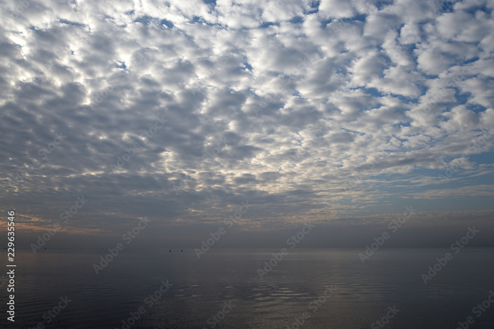 Altocumulus cloud over sea.