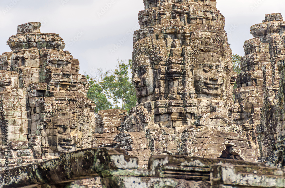 Smiling stone faces of the Bayon temple in Angkor Thom in Cambodia