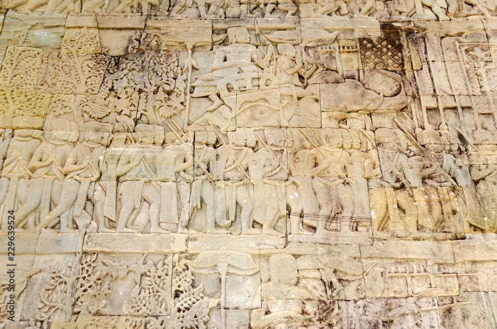 A scene from the gallery of the Bayon temple in Angkor Thom showing a Khmer army on the march