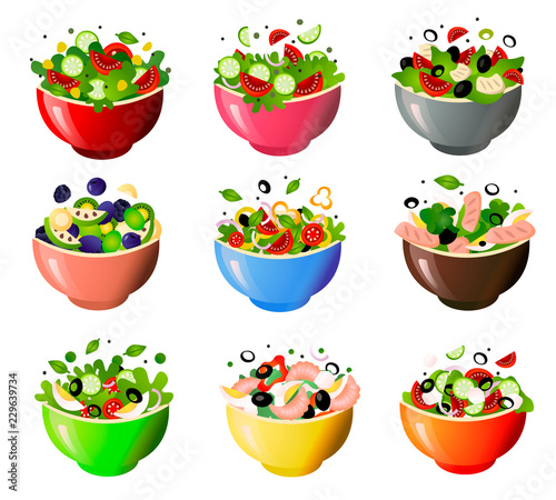 Green fresh salad of their various tasty vegetables in color bowls.