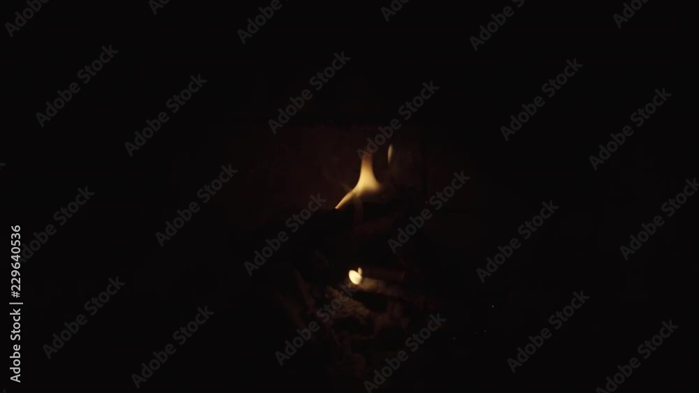 Fading Remnants of a Fire in a Brick Fireplace Fading Remnants of a Fire in a Brick Fireplace