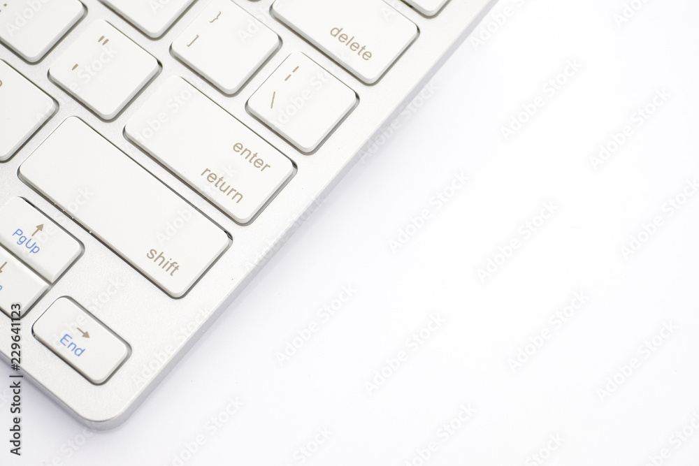 White keyboard close up on a white background. White keyboard close up on a white background.