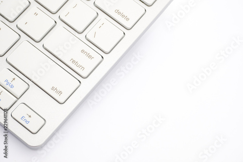 White keyboard close up on a white background.