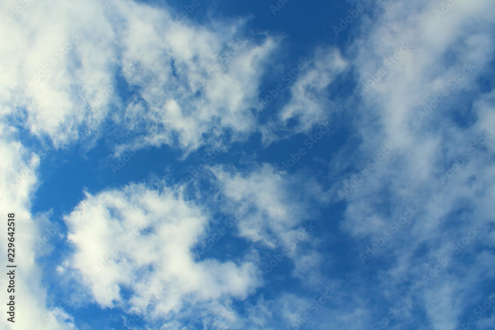 Blue sky and white cirrus clouds. Background. Landscape. Blue sky and white cirrus clouds. Background. Landscape.