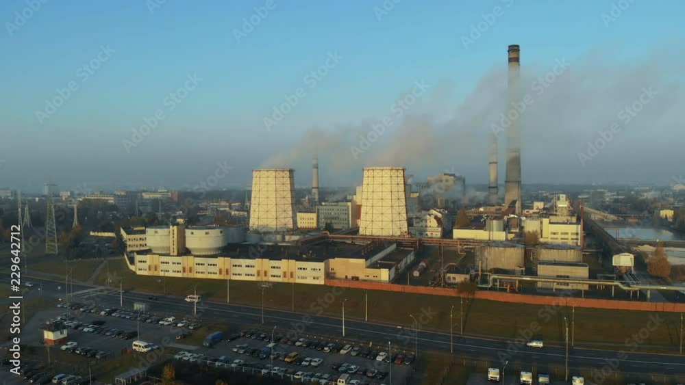 View of the air on the smoke and smog from the factory pipes in the city, air pollution. Aerial photography View of the air on the smoke and smog from the factory pipes in the city, air pollution. Aerial photography