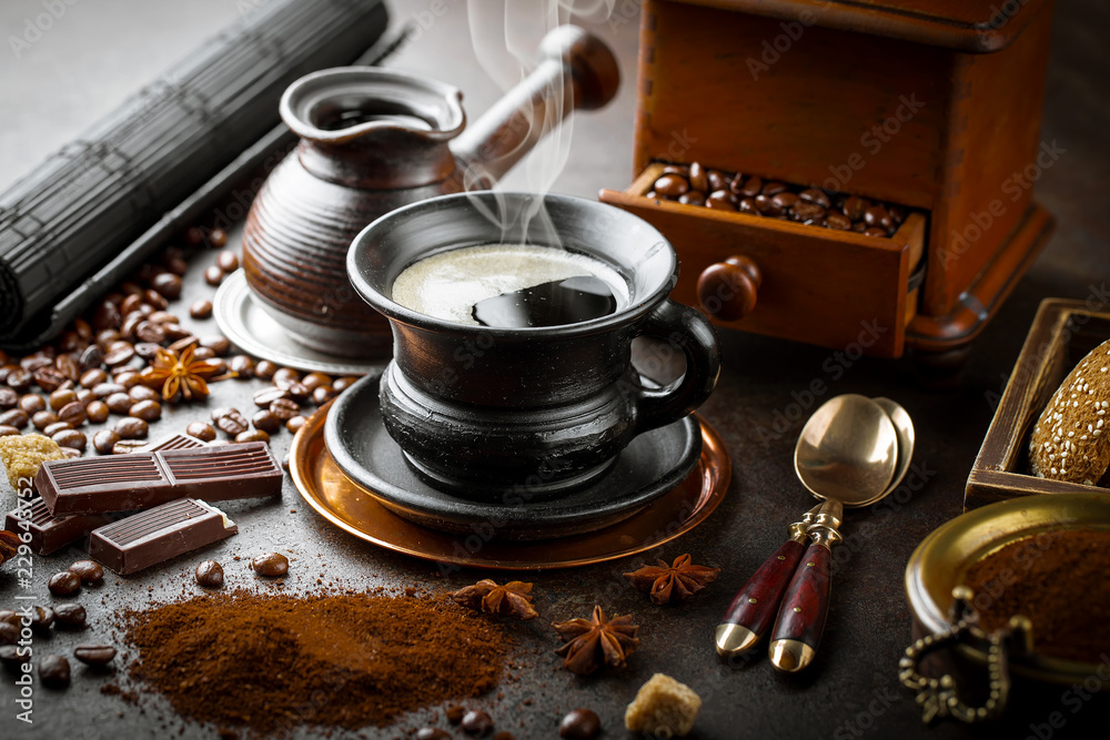 Black coffee in a cup on old background Black coffee in a cup on old background