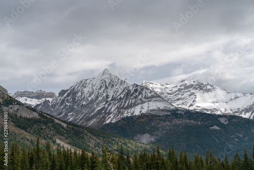 Distant snow dusted peaks in the Rocky Mountains © Jesse