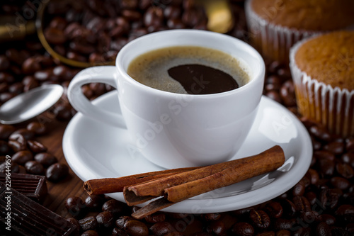 Black coffee on old background