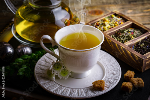 Tea in a cup on an old background