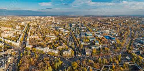 Aerial panoramic view Voronezh from height of aircraft flight. Voronezh synthetic rubber plant district in autumn.