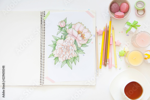 sketch drawing with colored pencils. flowers peonies. Candles, gifts, tea and white background photo