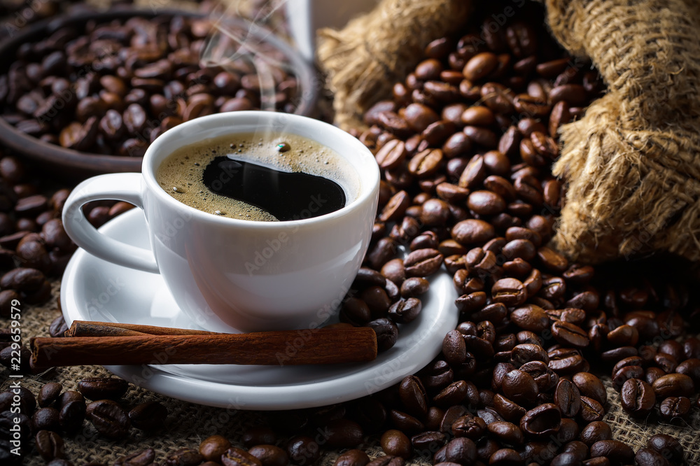 Fototapeta premium Black coffee in a composition with kitchen accessories