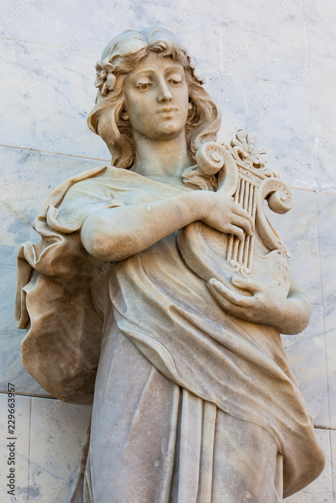 Terpsichore muse statue at the facade of the Adolfo Mejia theater in Cartagena de Indias