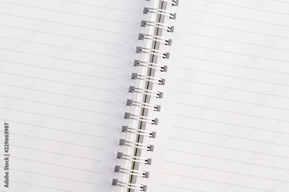 School book page. White empty paper spiral notebook School book page. White empty paper spiral notebook