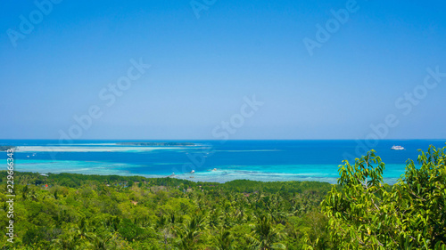 a forest and deep blue sea view from bukit love © maslakhatul