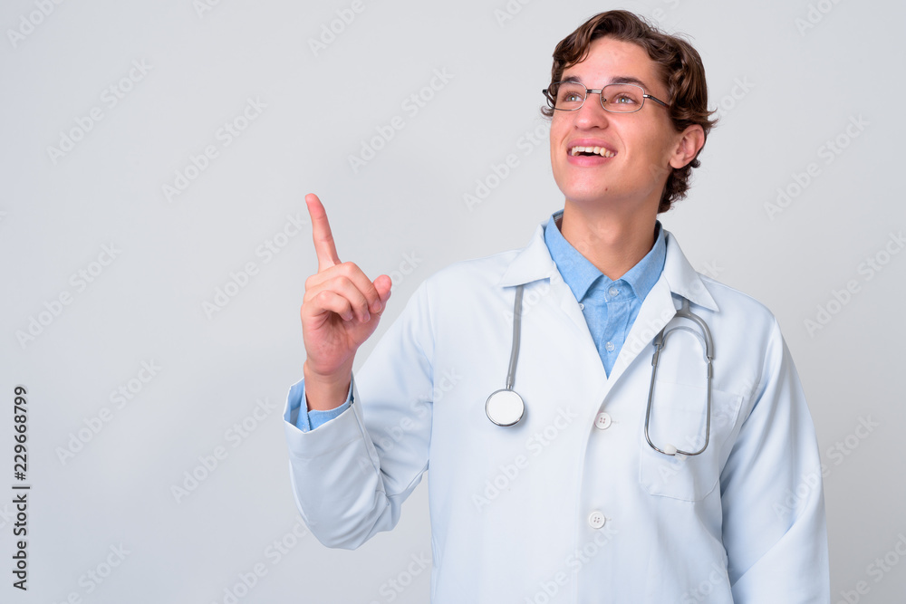 Portrait of young handsome man doctor with eyeglasses Portrait of young handsome man doctor with eyeglasses