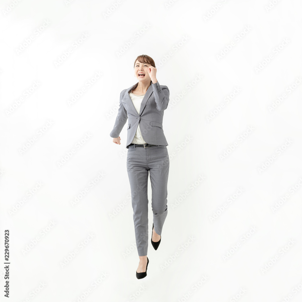 ビジネスウーマン・ジャンプ