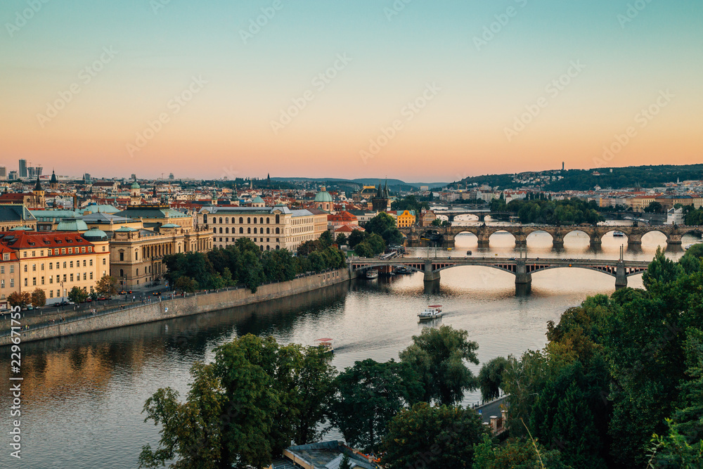 Prague city old buildings and Vltava river with sunset from Letna park in Prague, Czech