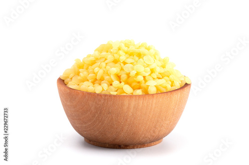 Bowl of Natural Yellow Beeswax Pearls photo