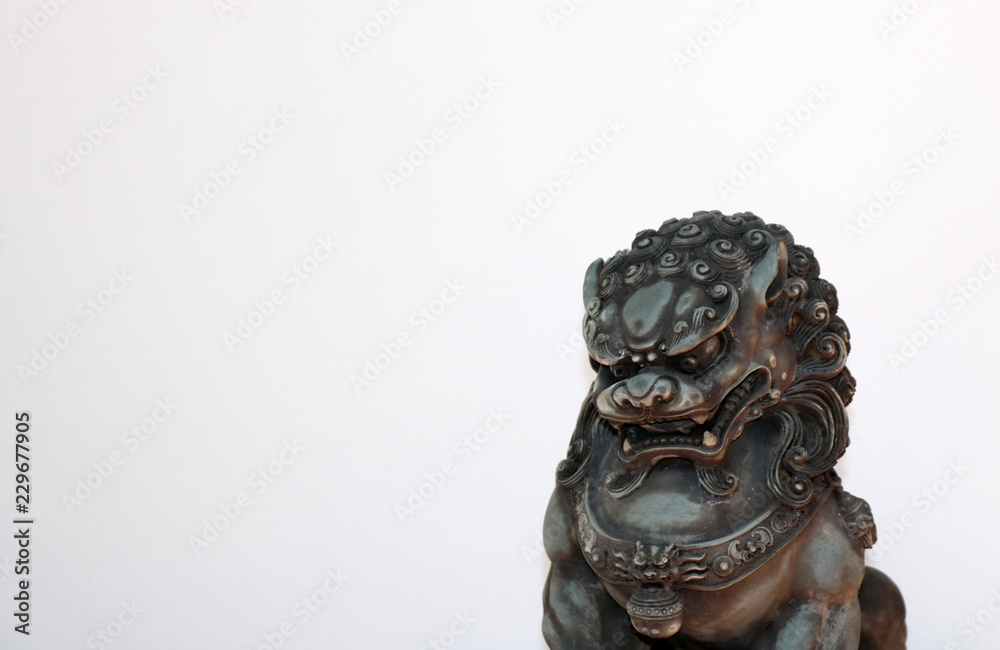 Bronze Asian Lion Statue isolated on white background Bronze Asian Lion Statue isolated on white background
