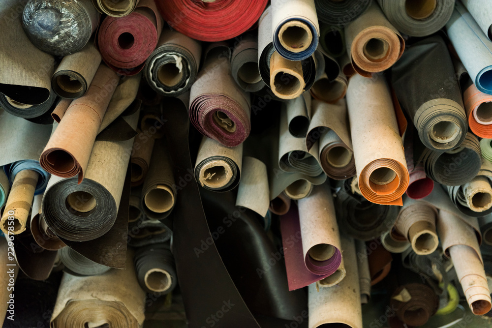 Stacked of Multicolored leather in rolls Stacked of Multicolored leather in rolls
