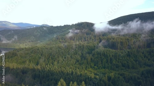 Aerial Drone Tracking Shot of the Romanian Mountains of Valea Draganului. photo