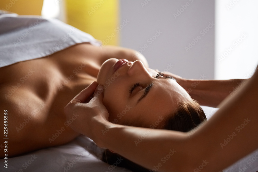 Head and face massage in spa salon Head and face massage in spa salon