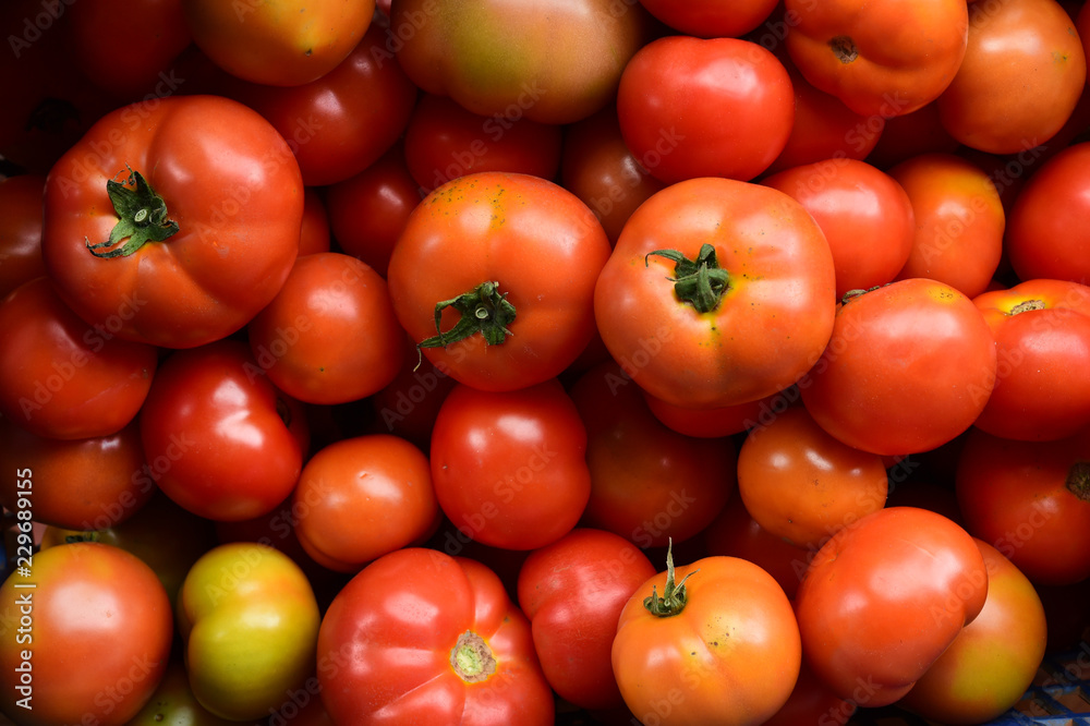 close up of red tomatoes for background close up of red tomatoes for background