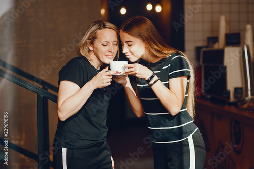 Mother with daughter in a cafe