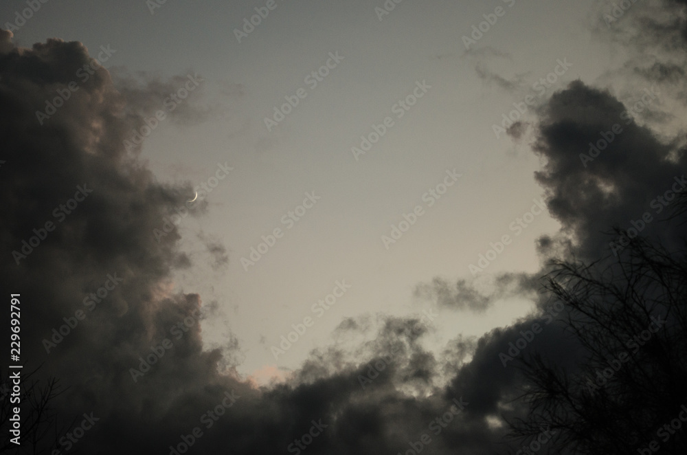 clouds in the light of the moon, the moon accompanied by clouds in the form of cotton in the light of the night clouds in the light of the moon, the moon accompanied by clouds in the form of cotton in the light of the night