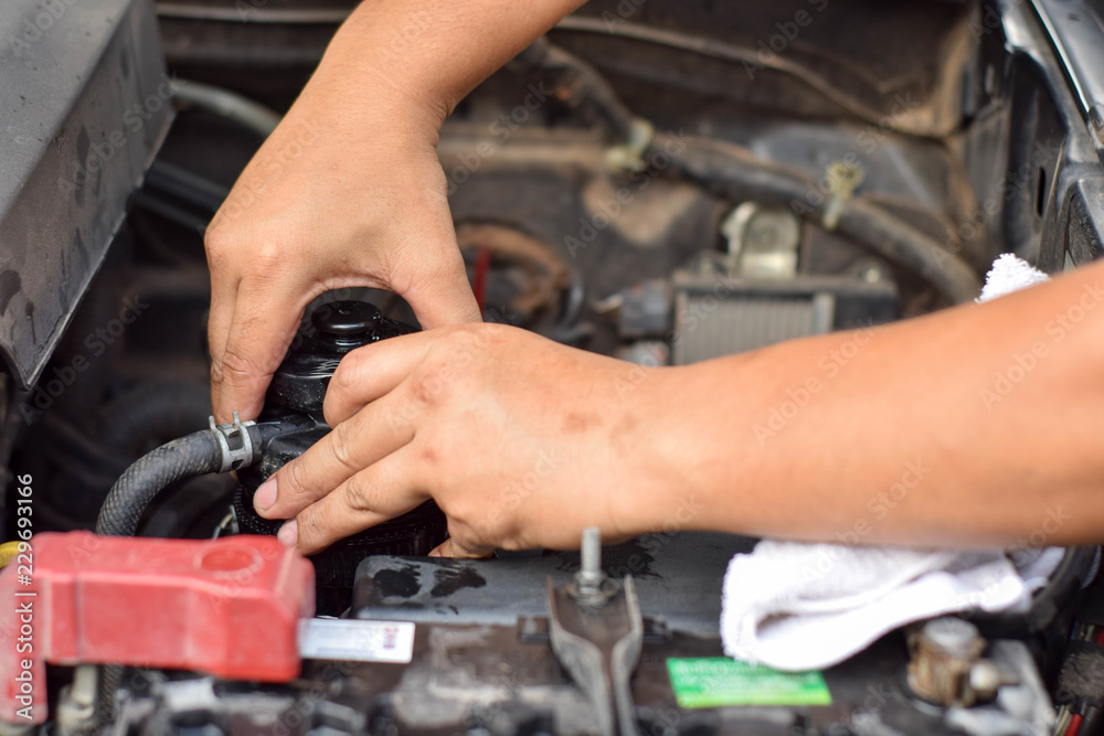 Engineers are repairing engines with tools. Engineers are repairing engines with tools.