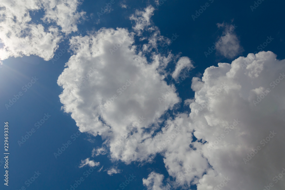 Obraz premium Clouds and blue sky in summer .