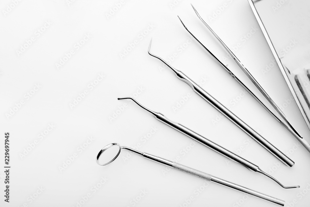 Dentist's tools on white background Dentist's tools on white background