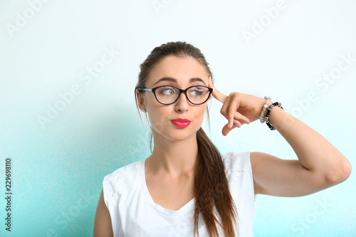 Emotional young woman on co...