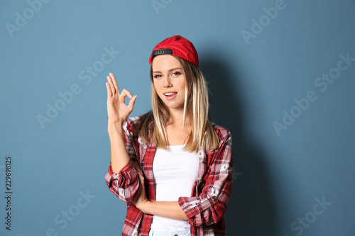 Beautiful young woman showi...