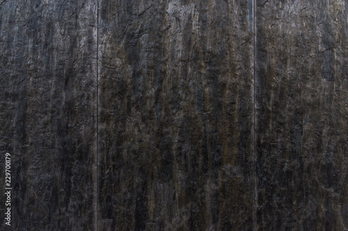 Fassade Ausschnitt mit Fliesen aus dunklem Naturstein Schiefer, Facade cutout with tiles of dark natural slate