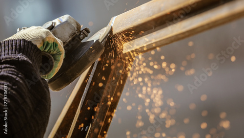 Sparks from cutting metal on the rack
