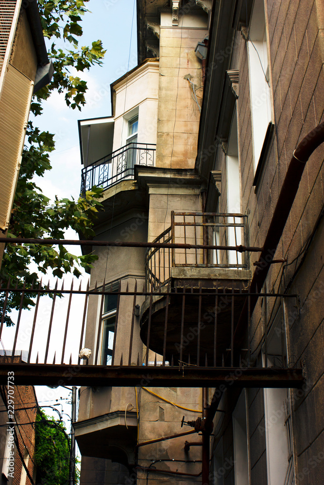 Old Tbilisi architecture, window and exterior decor in summer day Old Tbilisi architecture, window and exterior decor in summer day