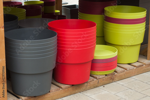 closeup of plastic pots in gardening store