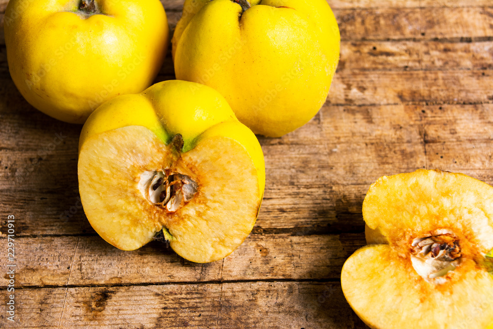 Yellow quince on a rustic table