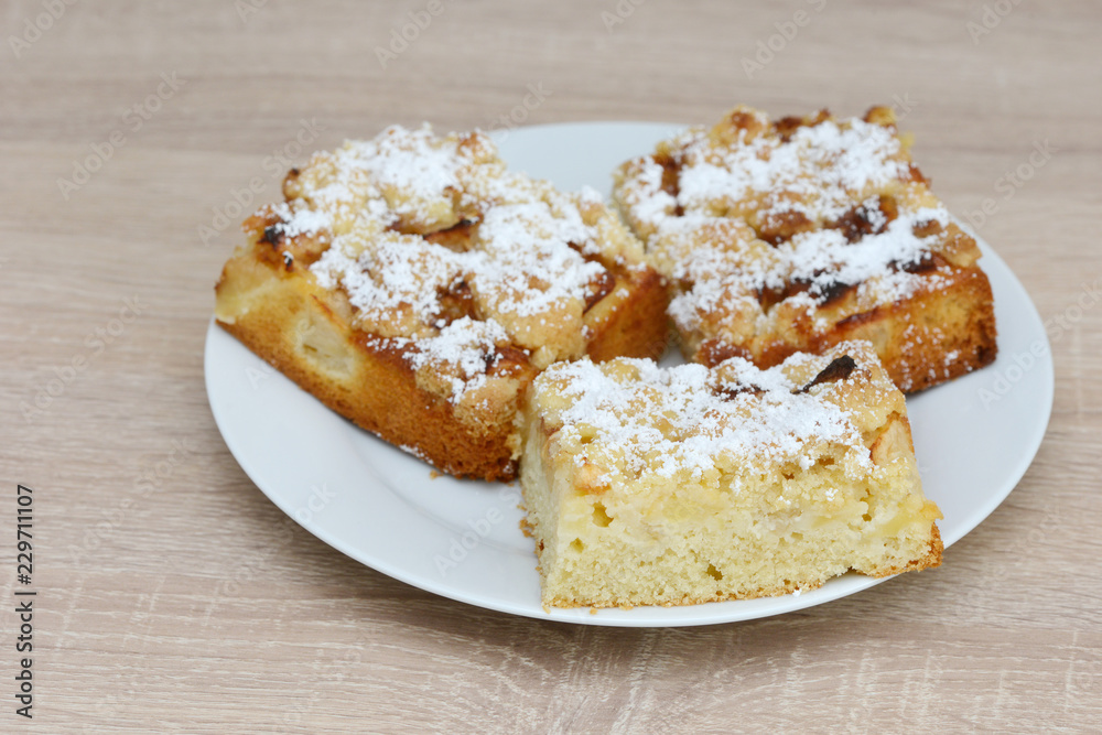 apple cake standing on table apple cake standing on table